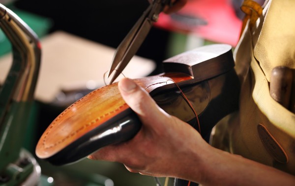 New heel being fitting onto a shoe